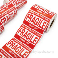manico fragile con etichetta adesiva di cura